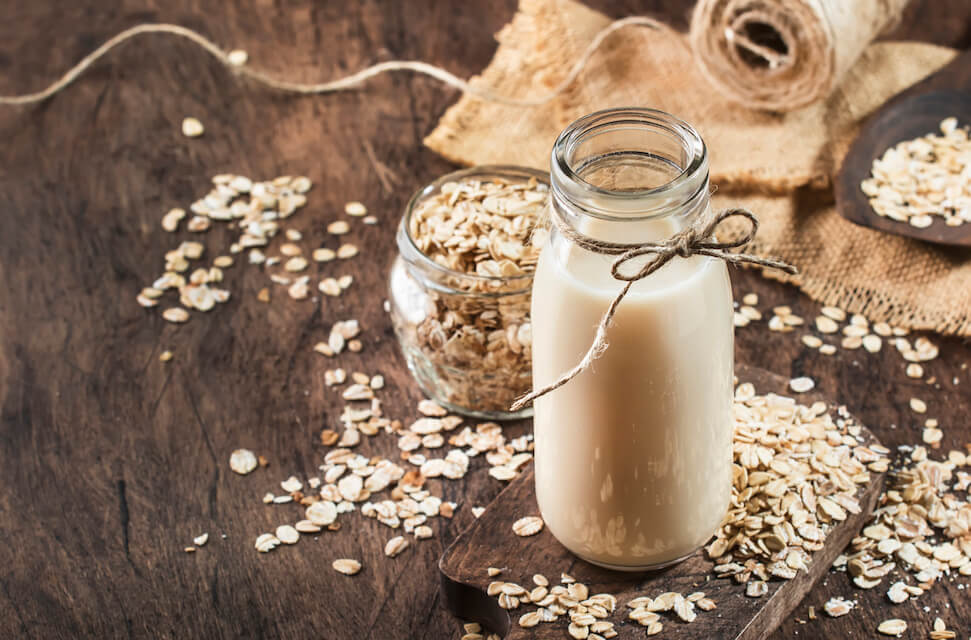 oat milk sitting on table for dairy free survival food supply